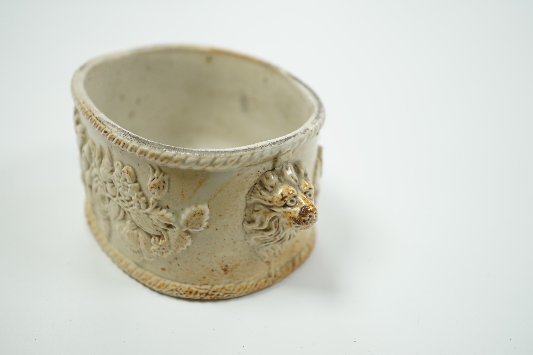 A mid 19th century saltglaze stoneware model of a foot bath, 12cm